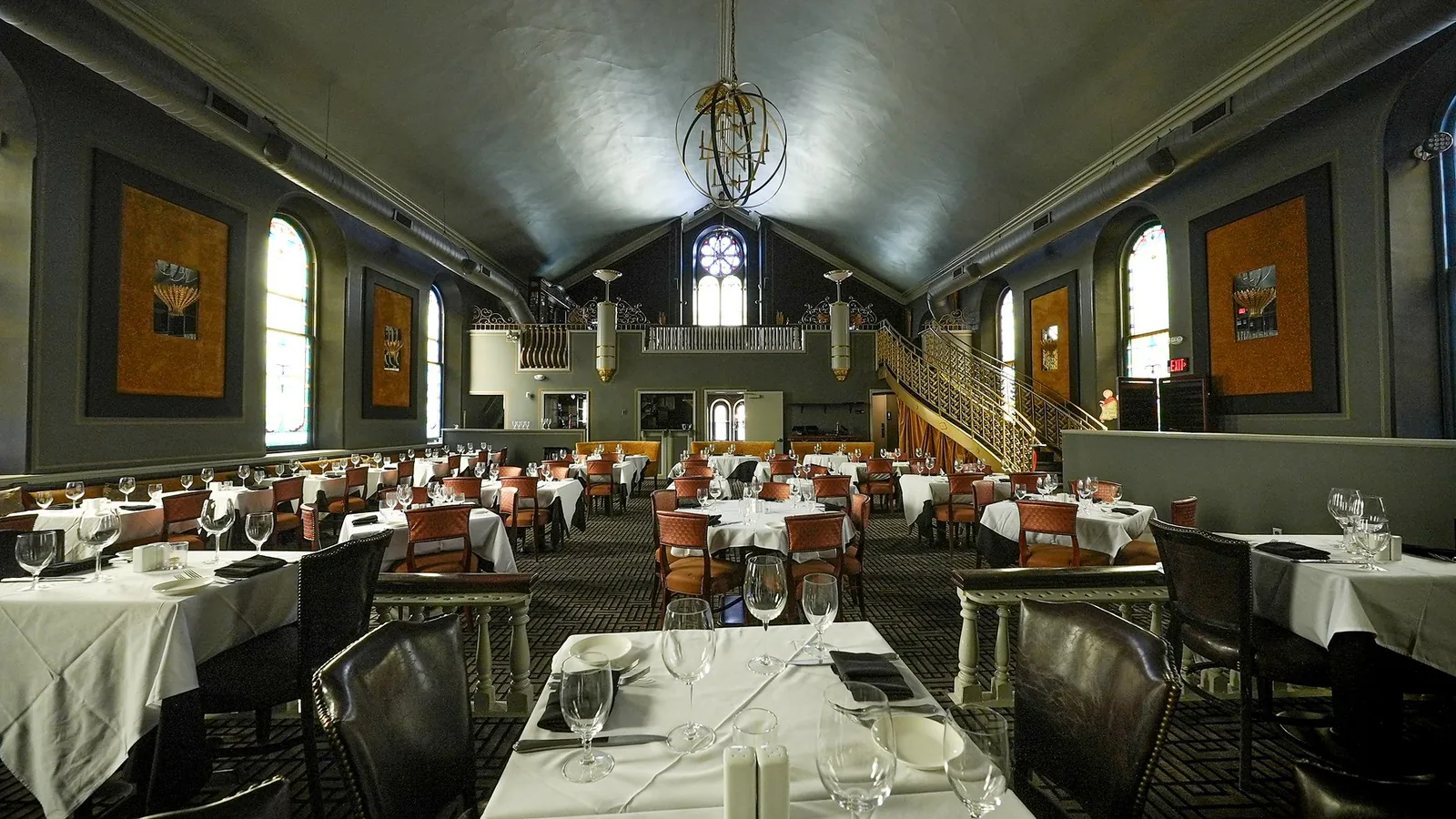 The main dining room by daylight, under the vaulted ceiling