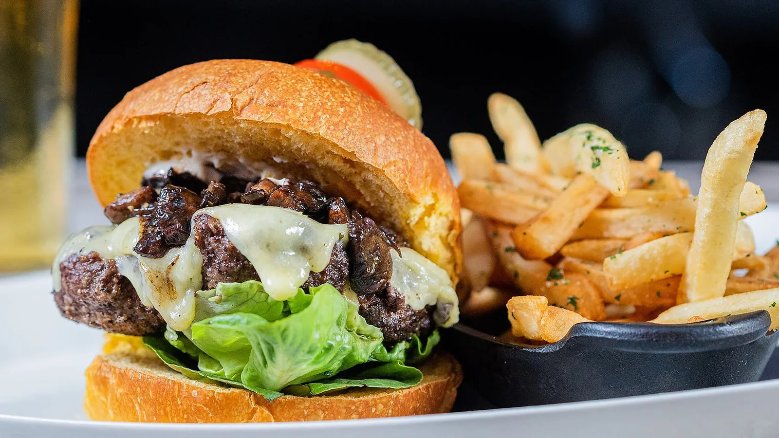 The OldeStone burger served with fries